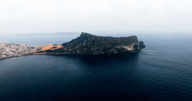Scenic Seongsan Ilchulbong Tuff Cone surrounded by the sea