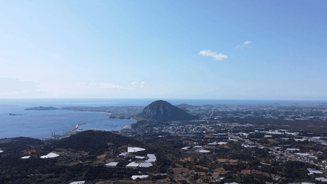 Vast landscape with mountains and sea