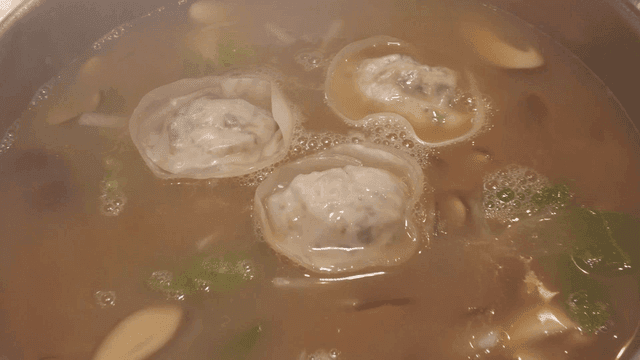 Tteokmanduguk, rice cake soup with dumplings.