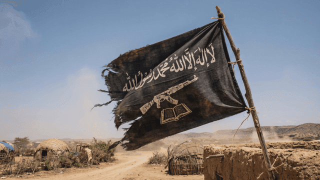 Torn flag of Islamic group