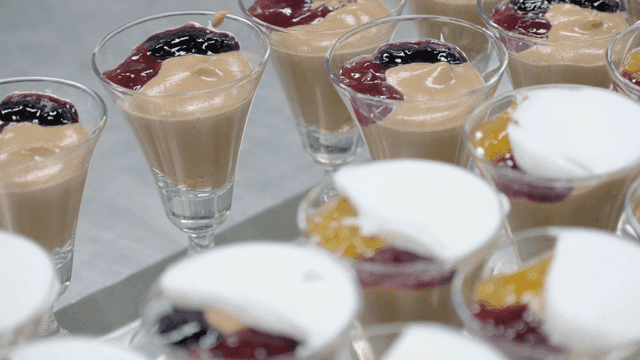 Colorful desserts in glass cups