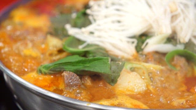 Pork backbone stew with fresh vegetables