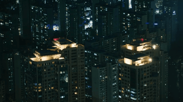 Night view of illuminated city buildings