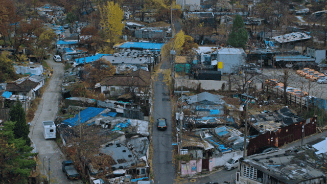 Car speeding through narrow rural road