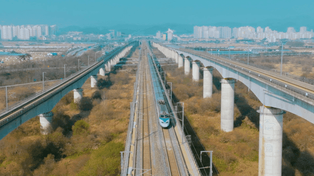 High-speed train on elevated tracks
