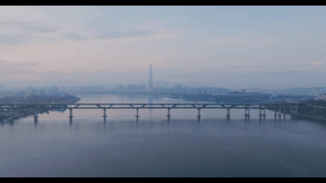 City skyline with a river and bridge