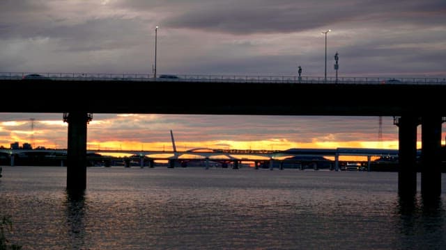 Sunset view over a river with bridges