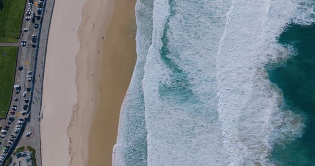 Waves Crashing on Sand Beach