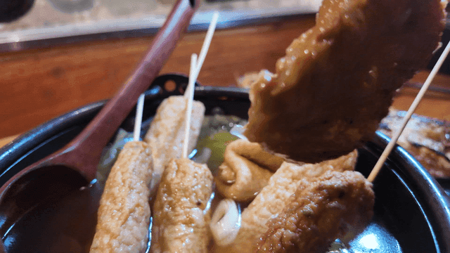 Fish cake skewers in soup
