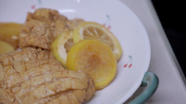 Lemon and chicken dish on a plate