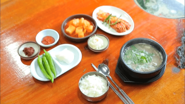 Ox bone soup and side dishes on a table