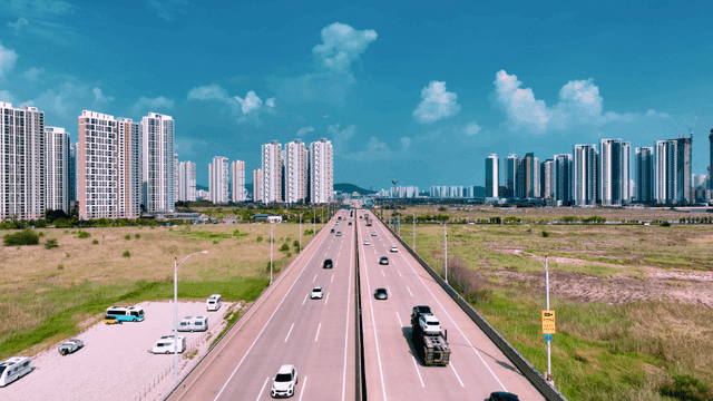 Highway leading to city skyline