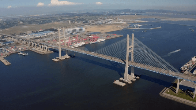 Long bridge over a busy port