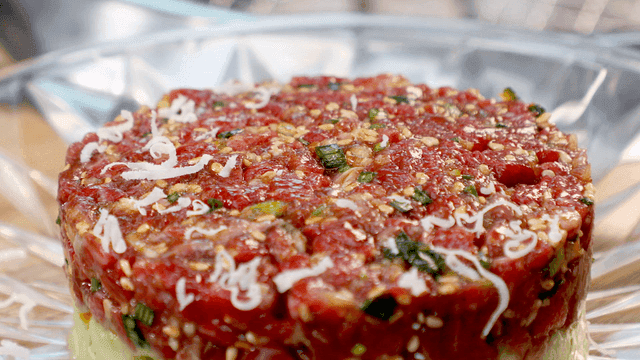 Fresh raw beef topped with cheese