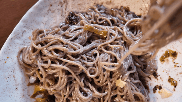 Plate of buckwheat noodles with vegetables