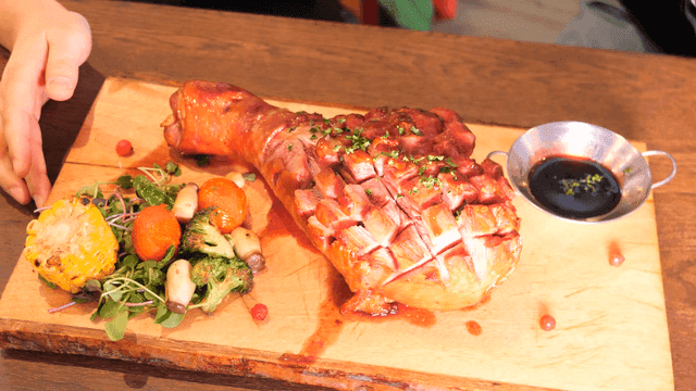 Roast turkey legs on table