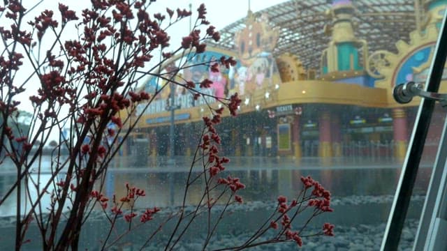 Amusement Park Entrance on a Rainy Day