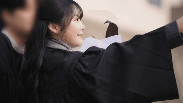 Graduates taking commemorative photos with friends