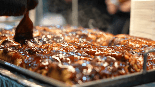 Pork belly rolls brushed with sauce