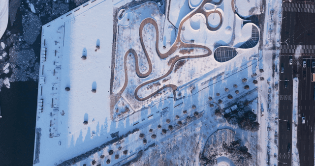 Snow-covered park and road scenery