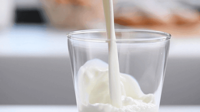 Milk being poured into a glass