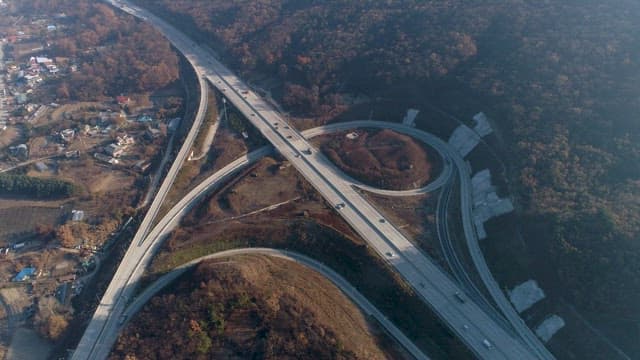 Highway Intersection Next to a Rural Village