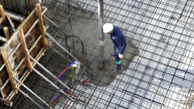 Concrete being poured at a construction site