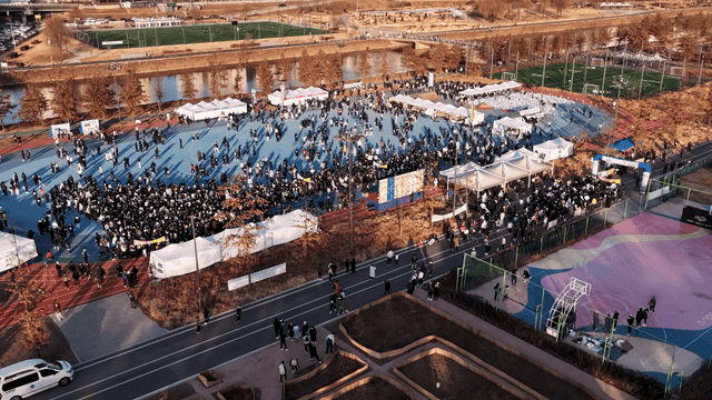 Stadium where outdoor event with large crowd is taking place