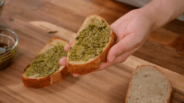 Basil pesto spread on bread