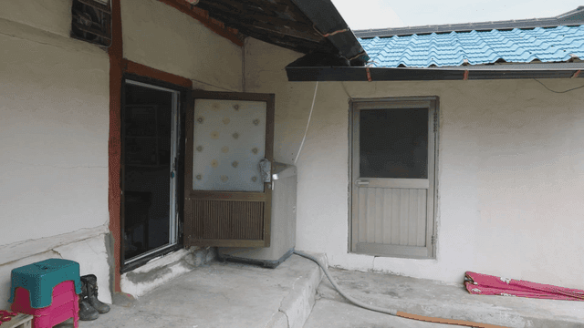 Traditional rural hanok with open doors