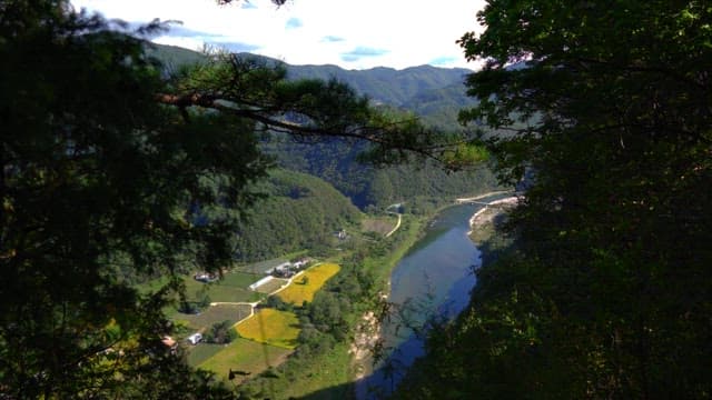 View of lush mountains and rivers from high above