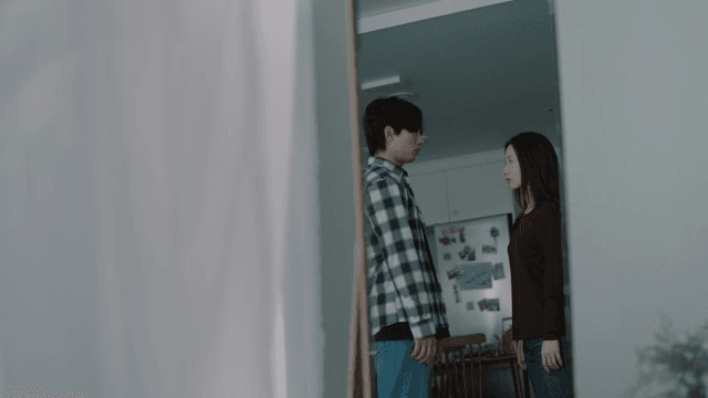 Couple in the kitchen having a conversation