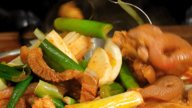Spicy Korean stew with vegetables and Braised Pig's feet