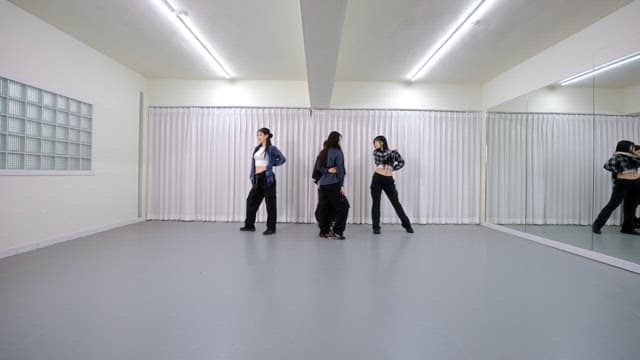 K-POP Dancers Practicing in a Studio