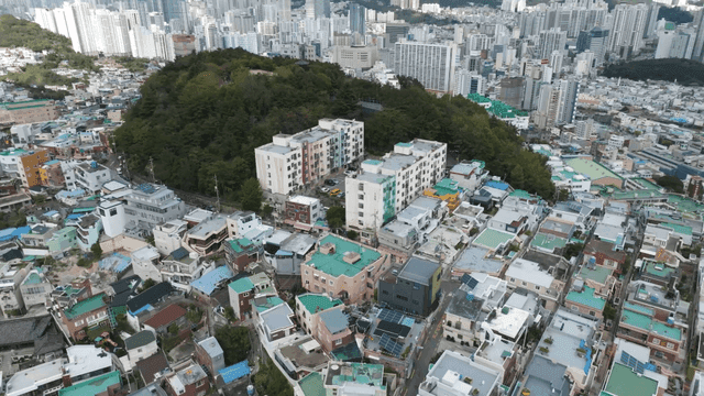 Aerial view of villa village with densely packed buildings