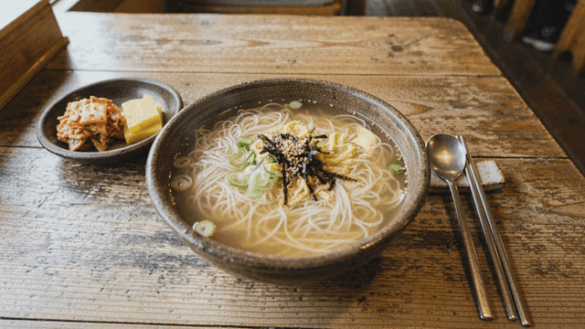 Bowl of hot Janchi-guksu on table