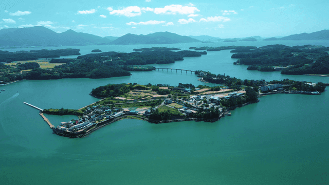 A scenic island surrounded by blue waters