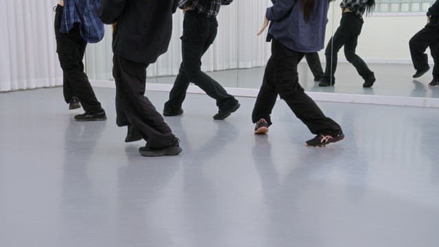 K-POP Dancers Practicing in a Studio