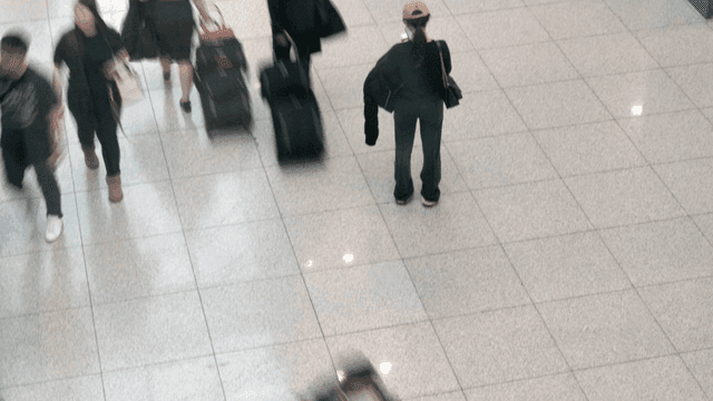 People walking in a busy terminal