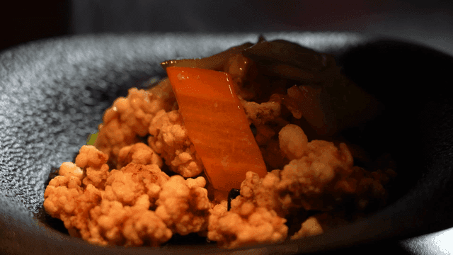 Warm sauce poured on plate serving tangsuyuk