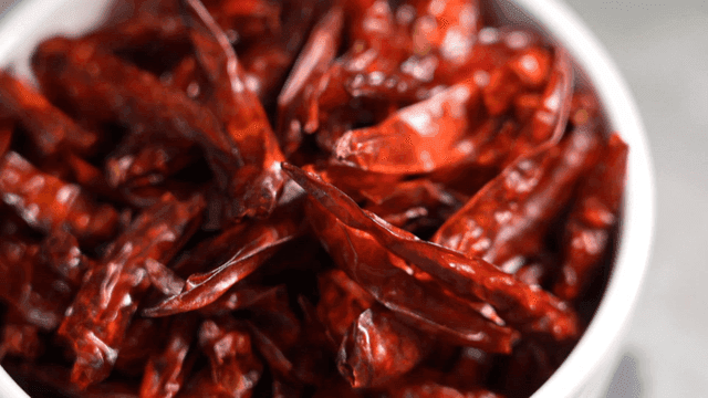 Bowl containing dried red chili peppers