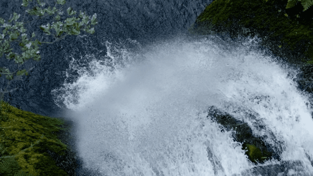 A powerful waterfall cascading down rocks