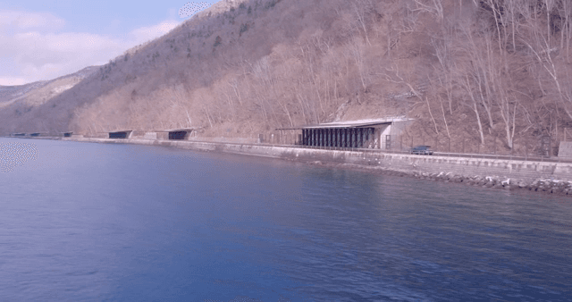 Car driving along a coastal road