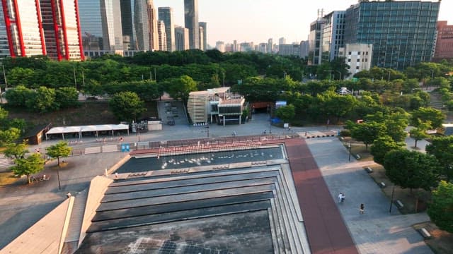 Riverside plaza with view of downtown skyscrapers