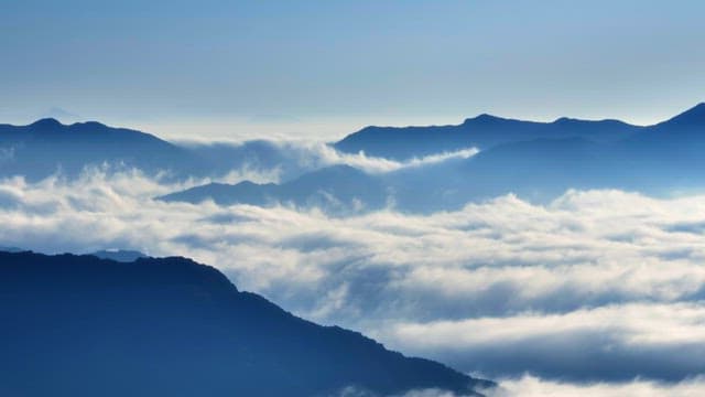 Mountains surrounded by clouds