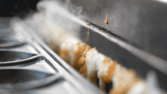Cheese melting on a grill