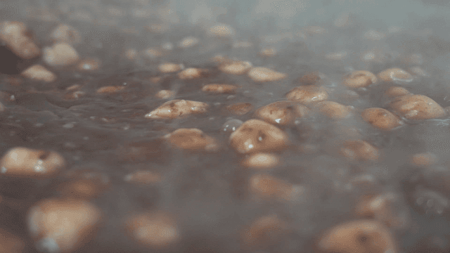 Red bean porridge boiling in pot