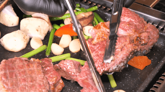 Steak and vegetables grilled on pan