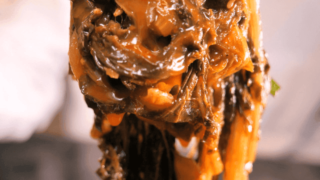 Moist shiitake mushrooms soaked in spicy broth