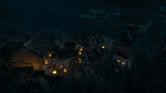 A traditional Korean house with lanterns lit up everywhere